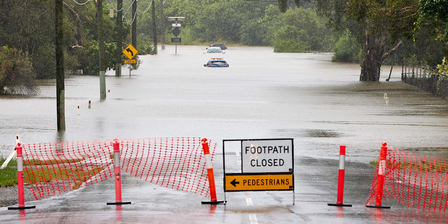 flooded-road-with-cars-in-water